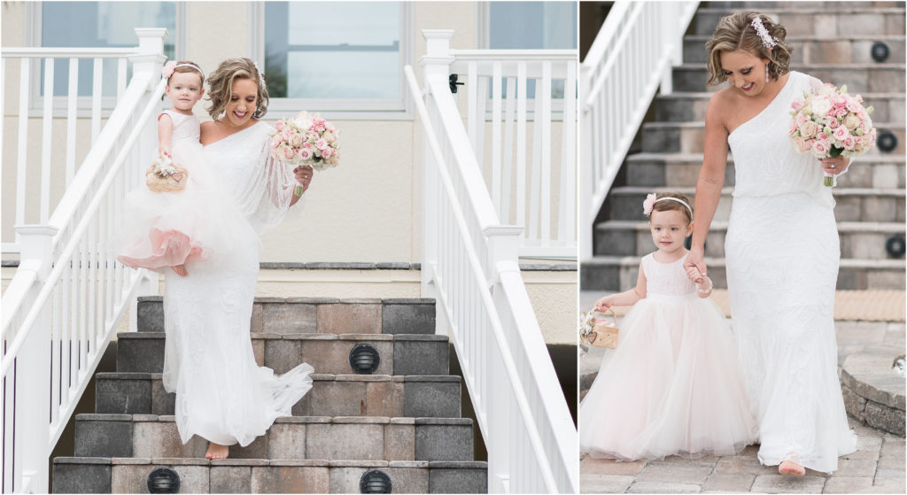 charlotte wedding photographers destination wedding in tampa florida bride with flower girl down staircase 