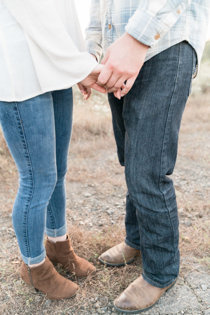 charlotte engagement photography shot of couple holding hands