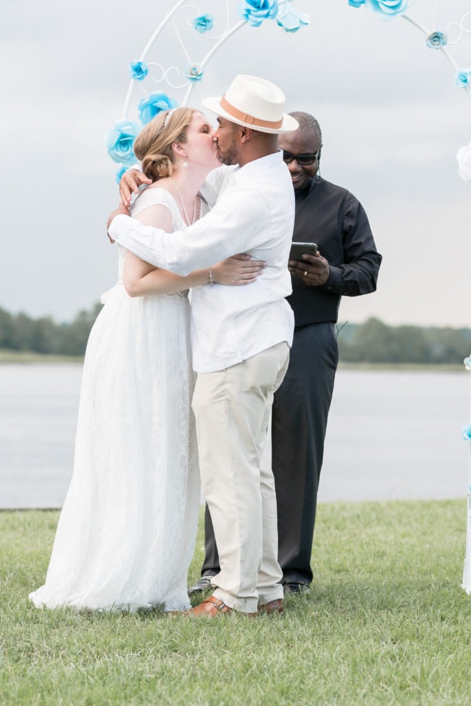charleston wedding photographer shot of bride and groom first kiss