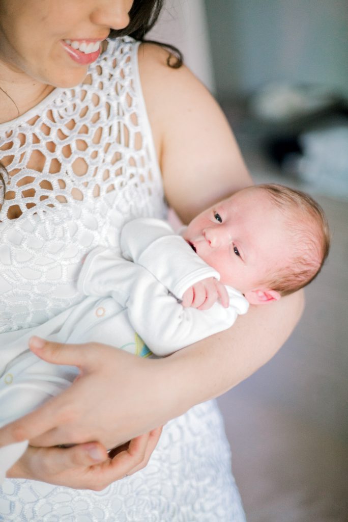 charlotte nc newborn photography mother holding baby fine art natural light