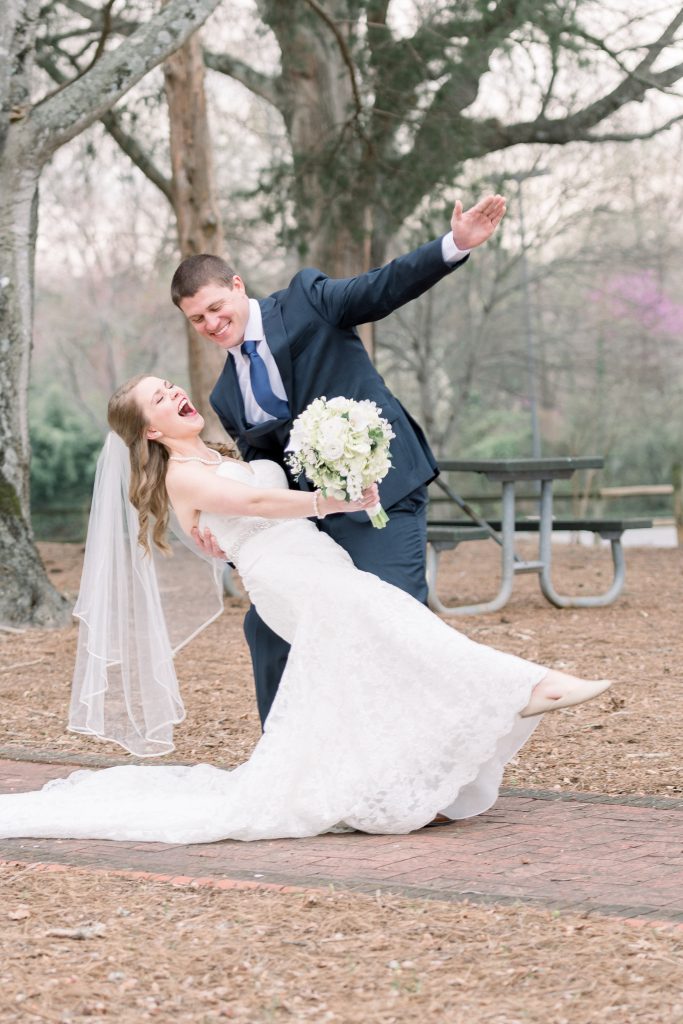 Wedding Photographer in Charlotte NC South Park Forrest Hill Church groom dips bride during first look