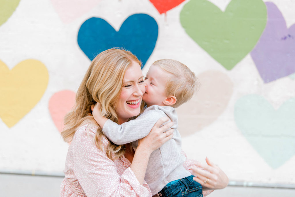 South End family session maternity session confetti hearts wall